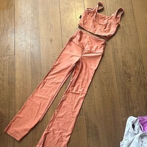 Tiger Friday peach/Coral set-top is AXS and pants are AXS Short; great condition